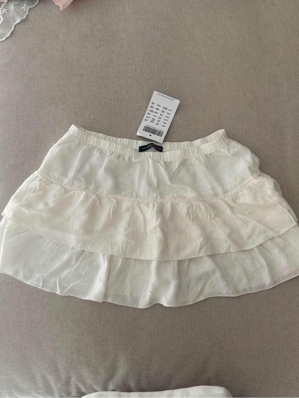 Brandy Melville Cream Tiered Mini Skirt